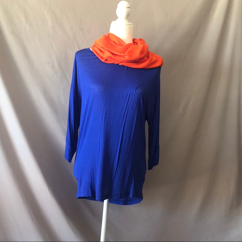 Blue shirt with orange scarf